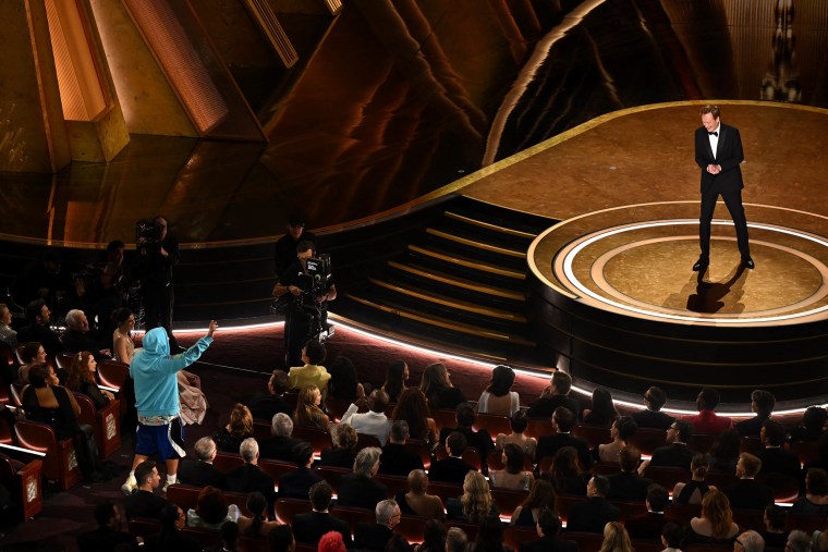Adam Sandler's Surprise Oscars 2025 Cameo: Outfit, Chalamet Hug, And Joke Explained Adam Sandler's Surprise Oscars 2025 Cameo: Outfit, Chalamet Hug, And Joke Explained