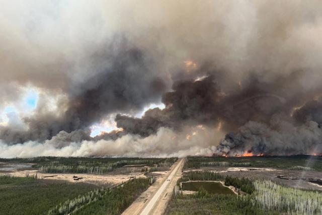 Massive Canadian Wildfires: Record-Breaking Evacuations And US Air Quality Concerns Massive Canadian Wildfires: Record-Breaking Evacuations And US Air Quality Concerns