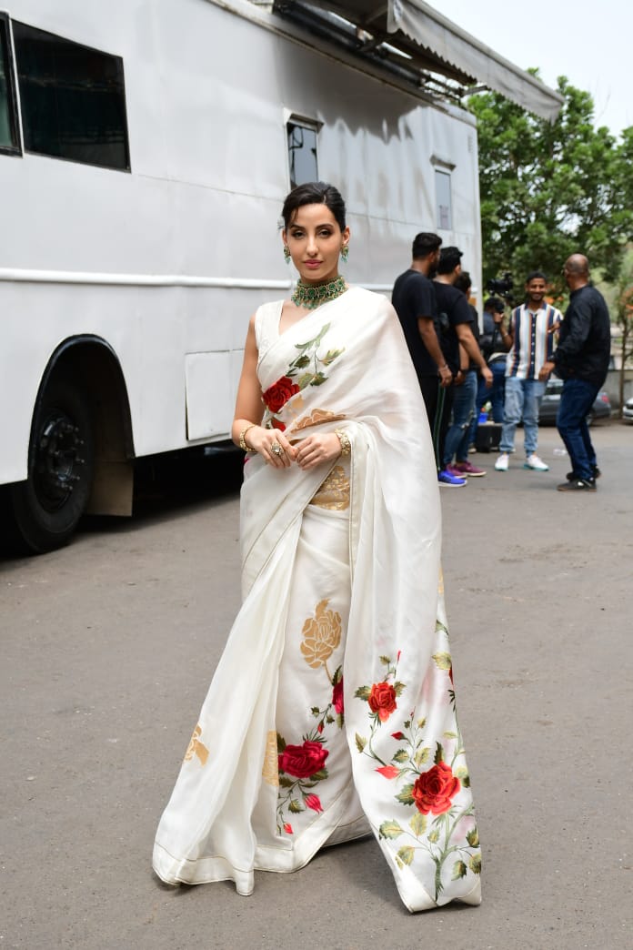 Nora Fatehi's Floral Saree: Ethnic Glam Perfection Nora Fatehi's Floral Saree: Ethnic Glam Perfection