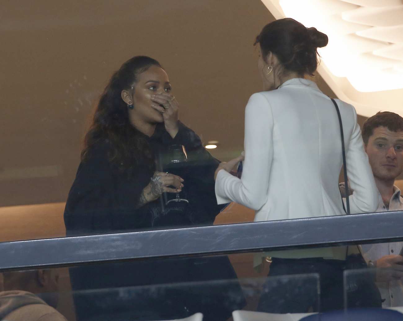 Rihanna Shares A Special Moment With A Fan In Paris Rihanna Shares A Special Moment With A Fan In Paris