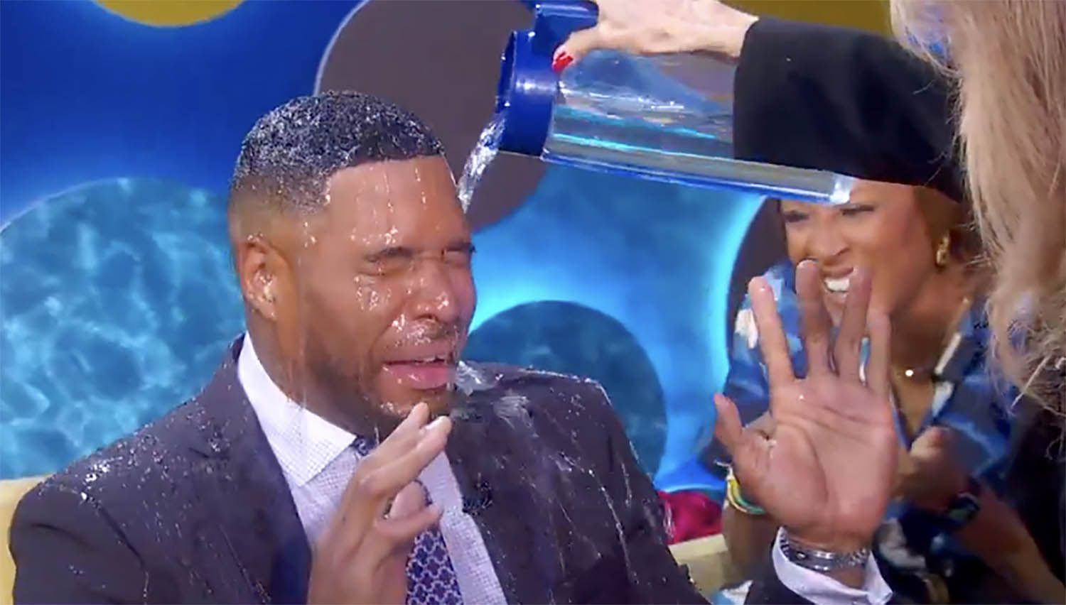 Susan Lucci Splashes Water On Michael Strahan: A Hilarious Moment Susan Lucci Splashes Water On Michael Strahan: A Hilarious Moment